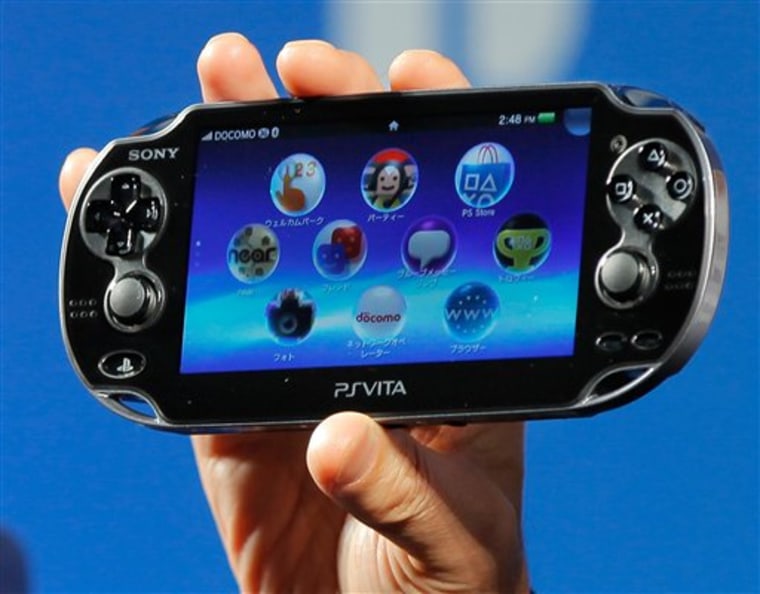 FILE - In this Sept. 14, 2011 file photo, Sony Computer Entertainment's PlayStation Vita is shown during a press conference in Tokyo. Sony's long-awaited PlayStation Vita portable game machine hits stores in Japan on Saturday Dec. 17 with the company predicting brisk sales even though the launch has missed much of the holiday shopping season. (AP Photo/Itsuo Inouye, File)
